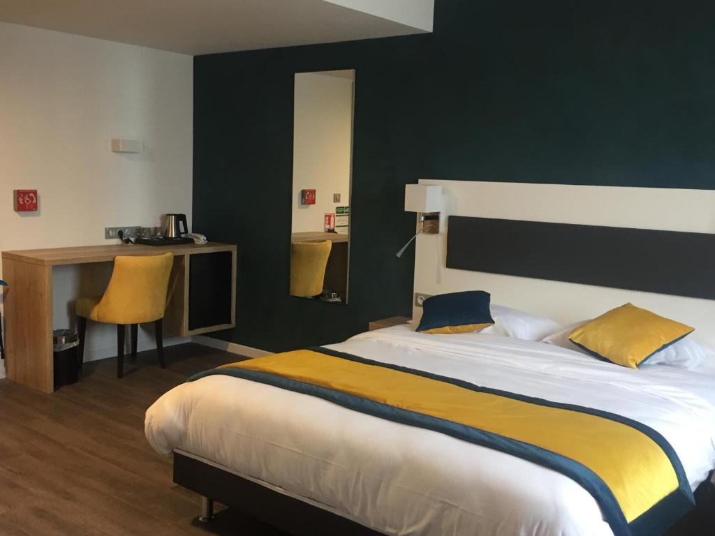 Postel nebo postele na pokoji v ubytování ATOLON PARK HOTEL