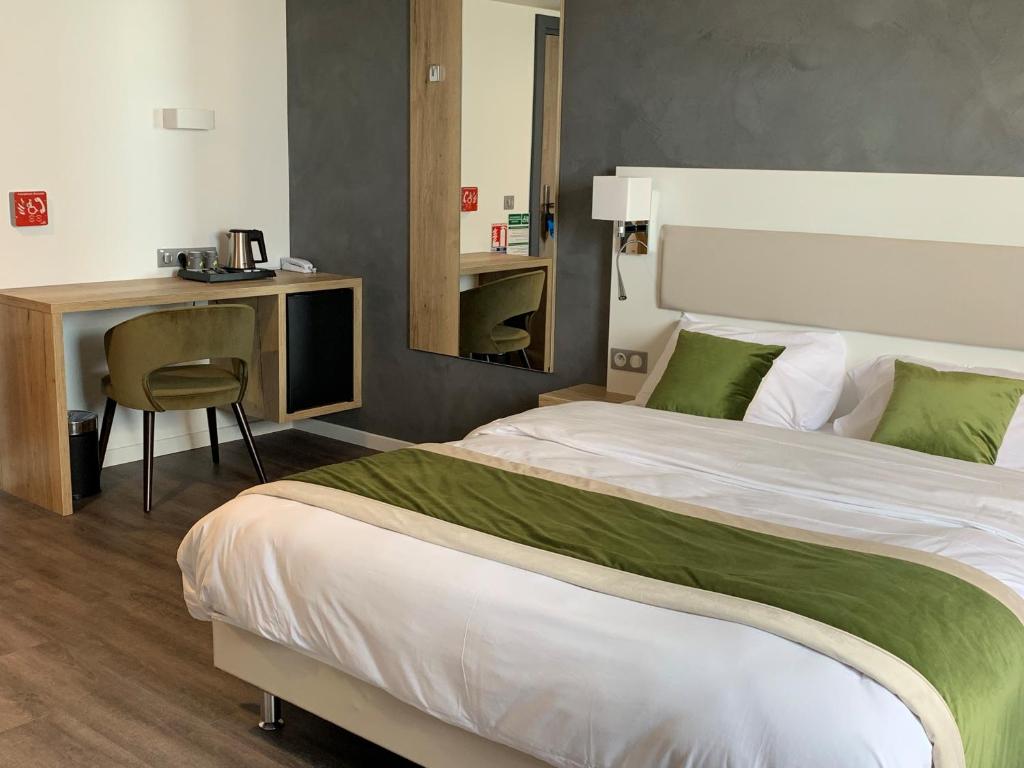 Postel nebo postele na pokoji v ubytování ATOLON PARK HOTEL