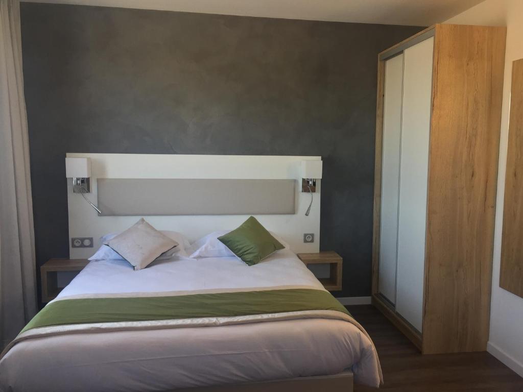 Postel nebo postele na pokoji v ubytování ATOLON PARK HOTEL