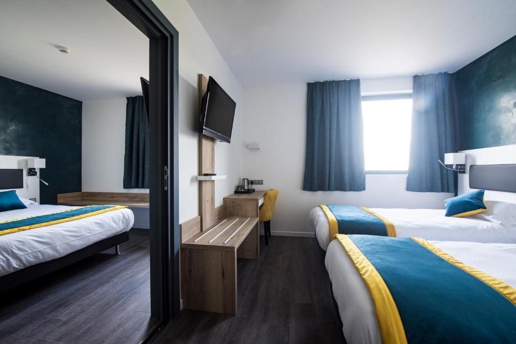 Postel nebo postele na pokoji v ubytování ATOLON PARK HOTEL