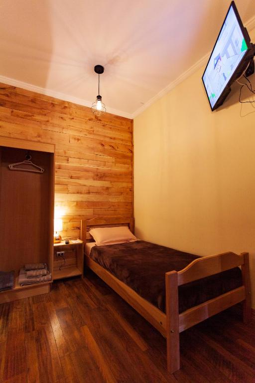 Postel nebo postele na pokoji v ubytování Hostal Boutique Patagonia Mística
