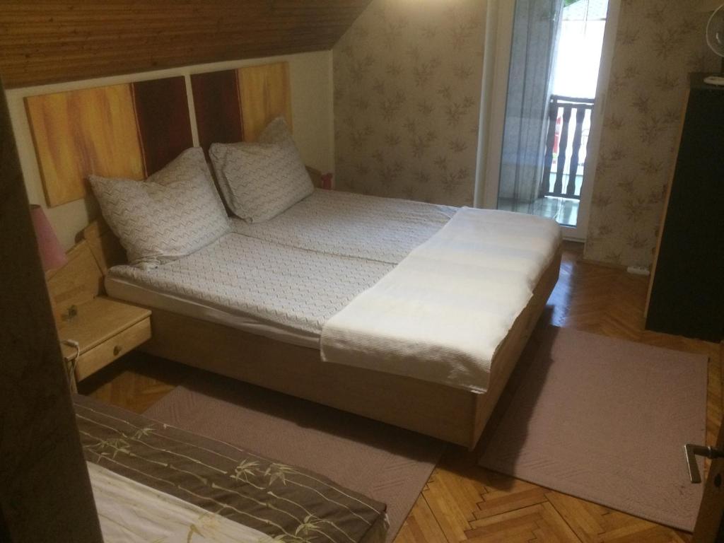 Posteľ alebo postele v izbe v ubytovaní Apartman Luca