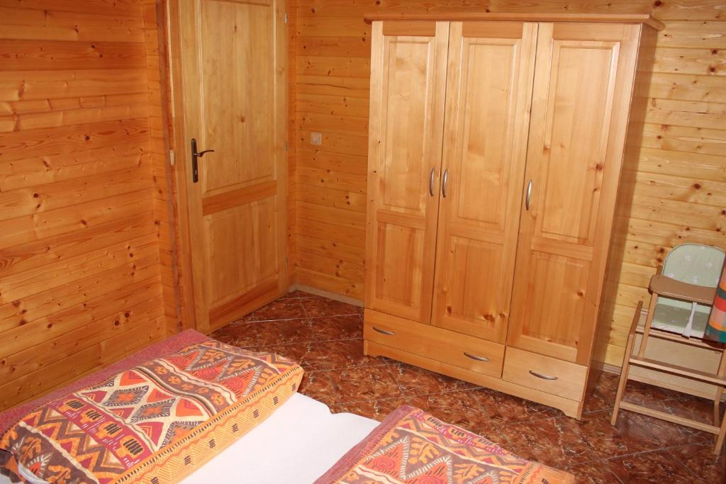 Postel nebo postele na pokoji v ubytování Apartmány a Chalupa Tara