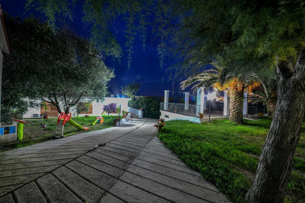A garden outside Residence Palm Beach