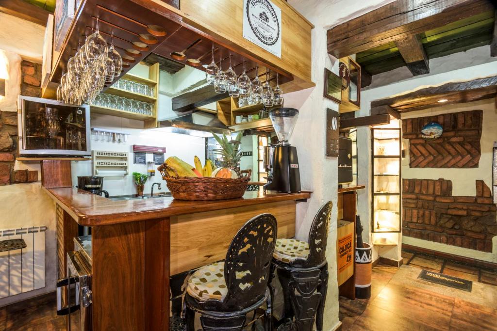 Kuchyň nebo kuchyňský kout v ubytování Hotel Muisca