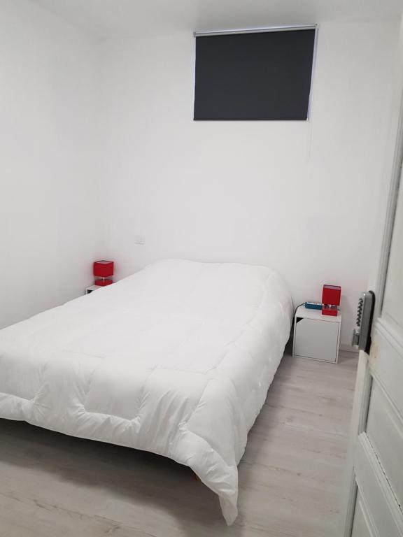 Postel nebo postele na pokoji v ubytování Lourdes Guest House