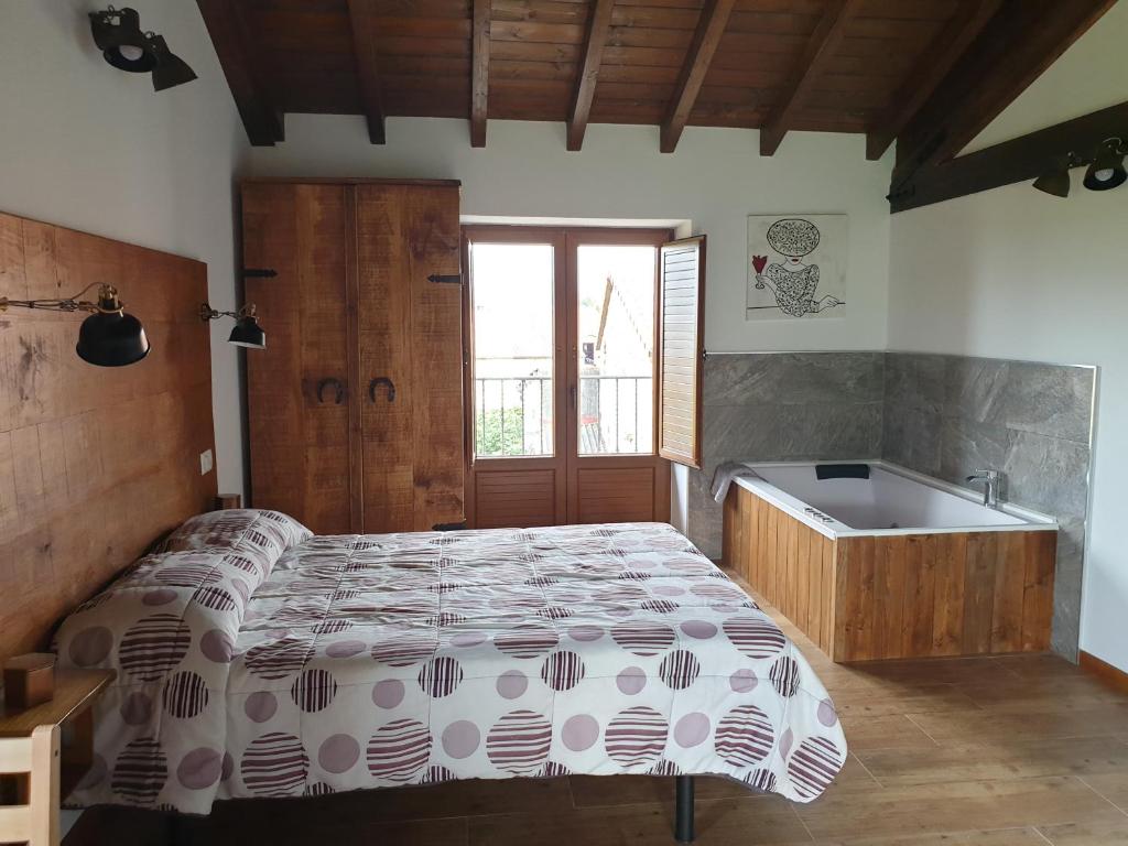 Posteľ alebo postele v izbe v ubytovaní Apartamento del Abuelo