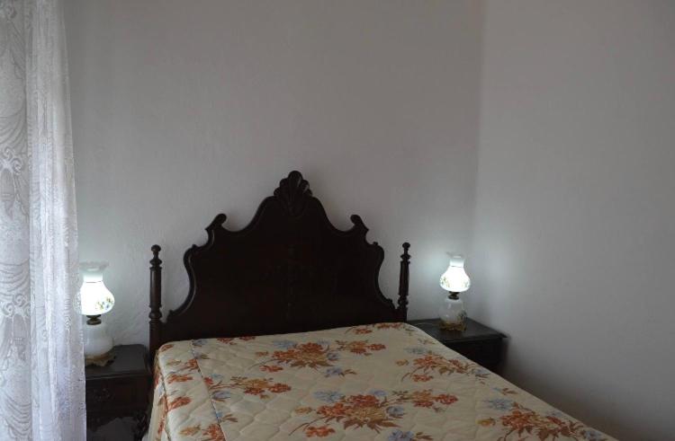 Postel nebo postele na pokoji v ubytování Casa Brito Aguiar