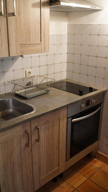 Kuchyň nebo kuchyňský kout v ubytování Domaine du Manoir de Vains