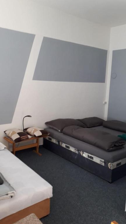 Postel nebo postele na pokoji v ubytování Ubytování Kozov