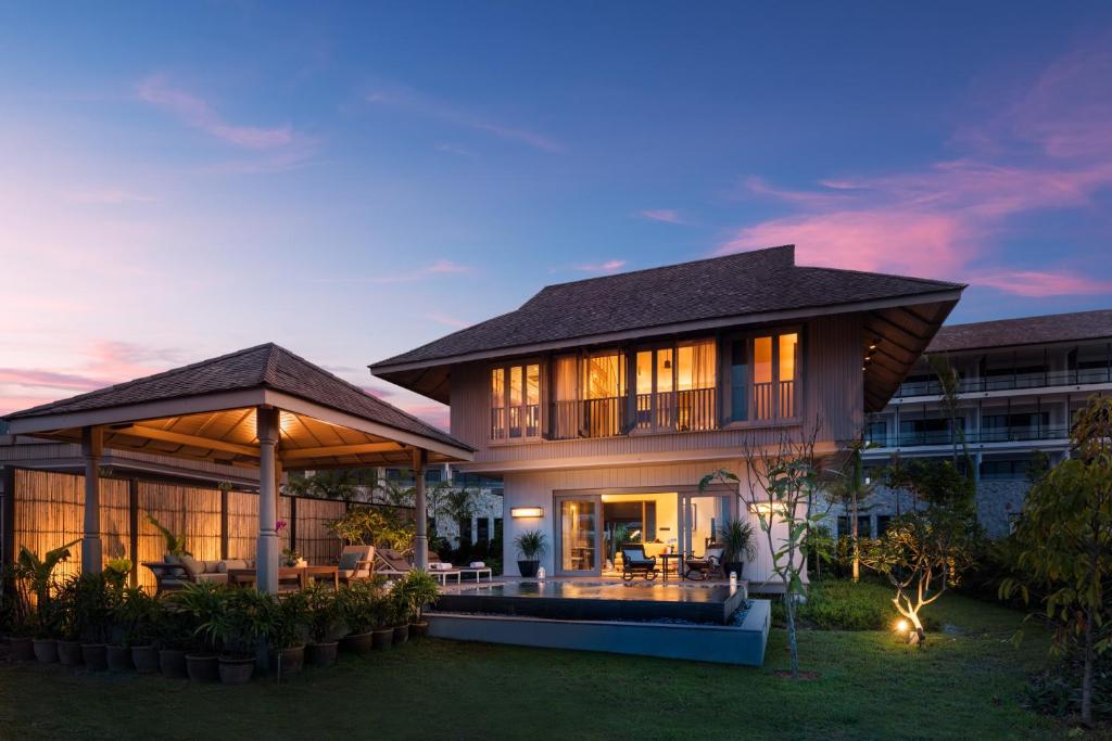 a villa with a view of a building at Anantara Desaru Coast Resort & Villas in Desaru