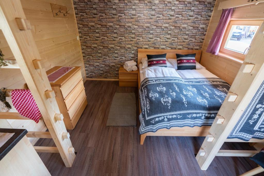 Postel nebo postele na pokoji v ubytování Camping Danica Cottage Stan