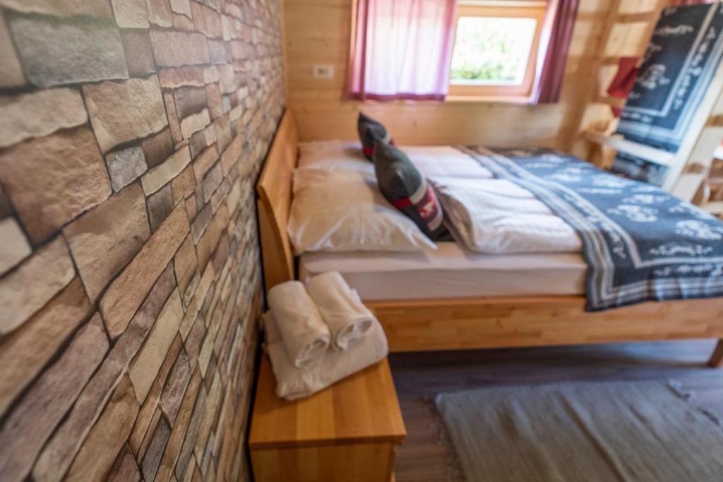Postel nebo postele na pokoji v ubytování Camping Danica Cottage Stan