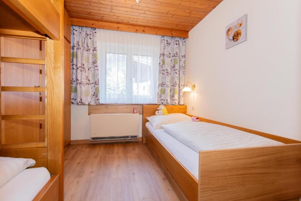 Posteľ alebo postele v izbe v ubytovaní Rainberghof