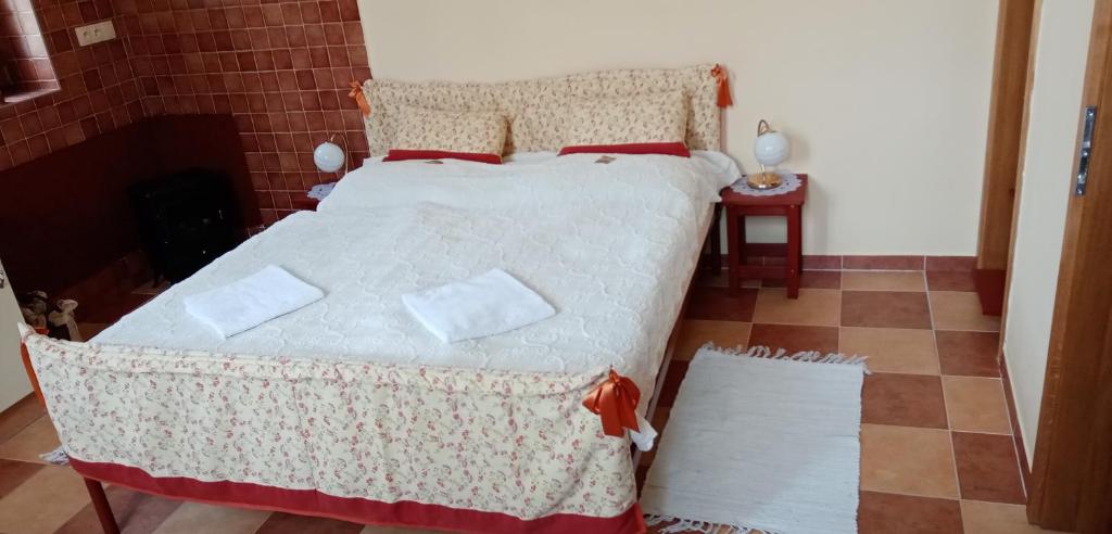 Postel nebo postele na pokoji v ubytování U Bílého koníka