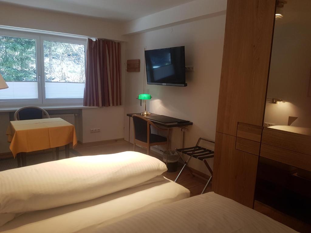 Postel nebo postele na pokoji v ubytování Comfort Rooms Bruckner