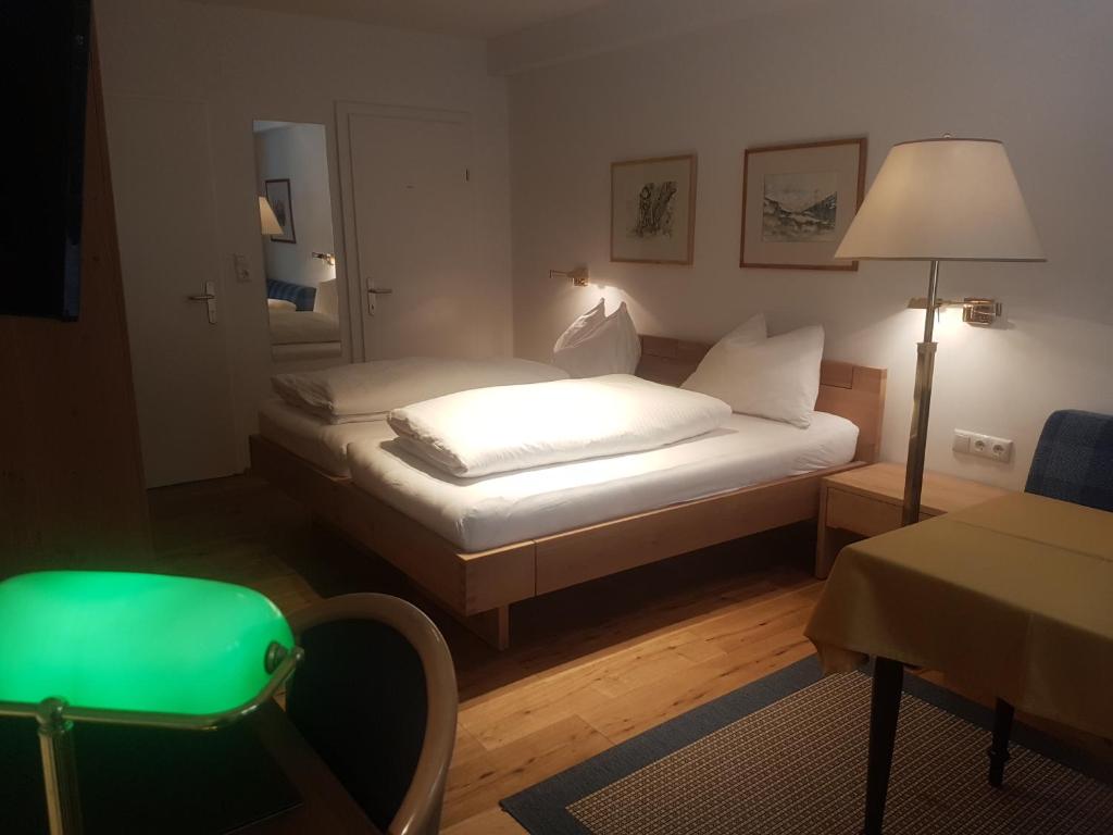 Postel nebo postele na pokoji v ubytování Comfort Rooms Bruckner