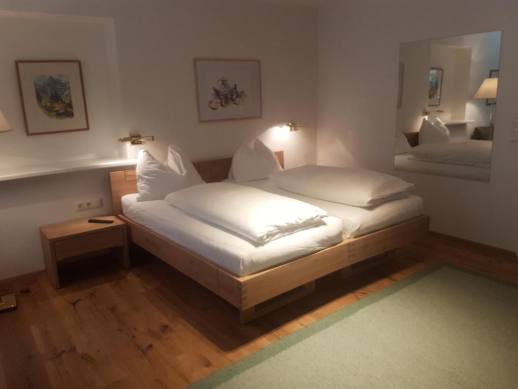 Postel nebo postele na pokoji v ubytování Comfort Rooms Bruckner