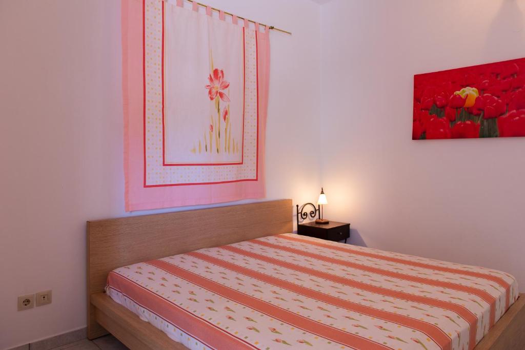 Postel nebo postele na pokoji v ubytování Arhontou