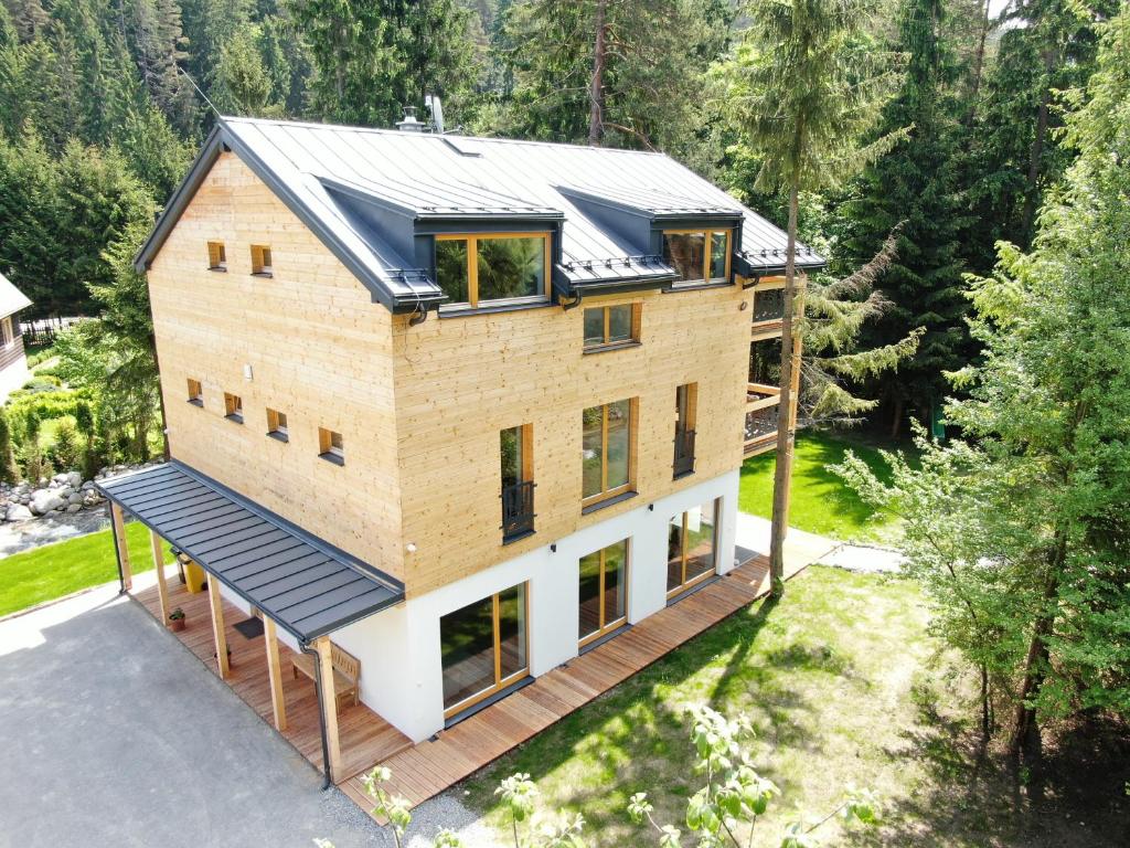 an overhead view of a house with a metal roof at Chata Tatransky Medved in Belá