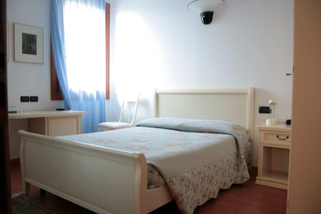 Postel nebo postele na pokoji v ubytování Hotel Ristorante La Rua