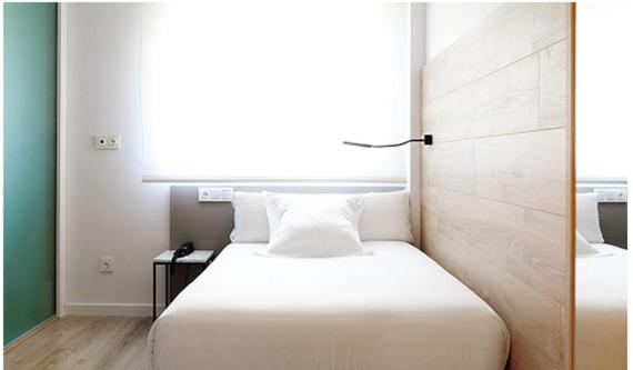 Postel nebo postele na pokoji v ubytování Hotel Bide Bide Tolosa