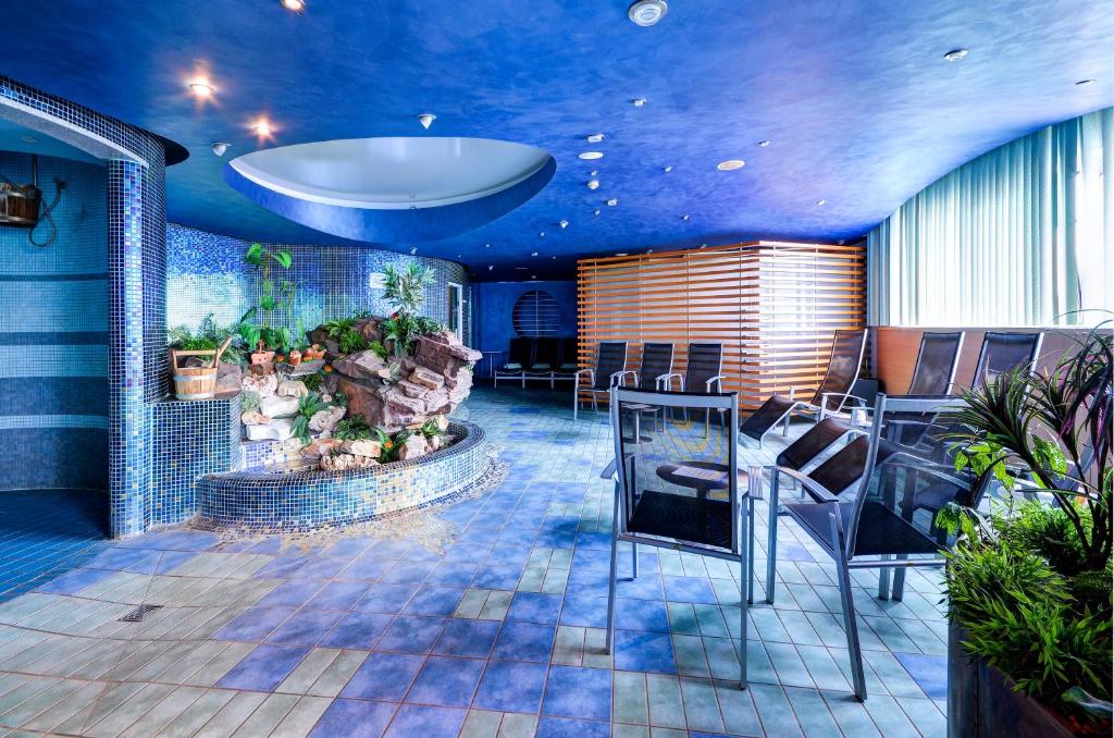 Posezení v ubytování Hotel EMPIRE