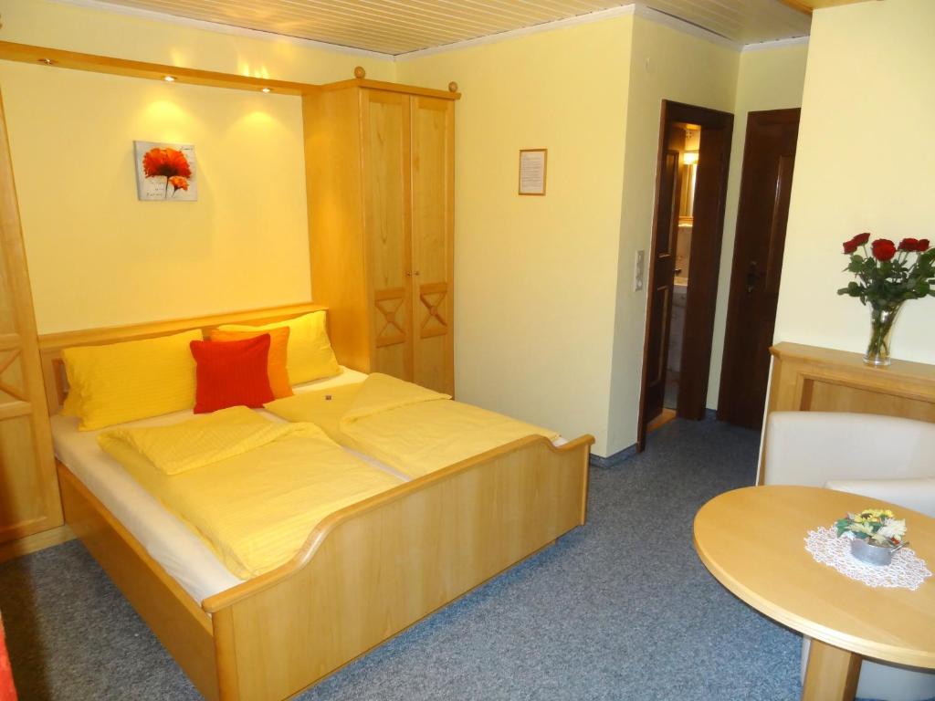 Postel nebo postele na pokoji v ubytování Pension Appartements Reithof