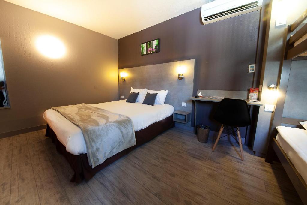 Postel nebo postele na pokoji v ubytování Hotel Lune Etoile