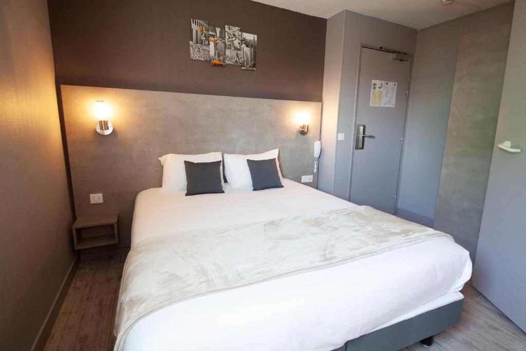 Postel nebo postele na pokoji v ubytování Hotel Lune Etoile