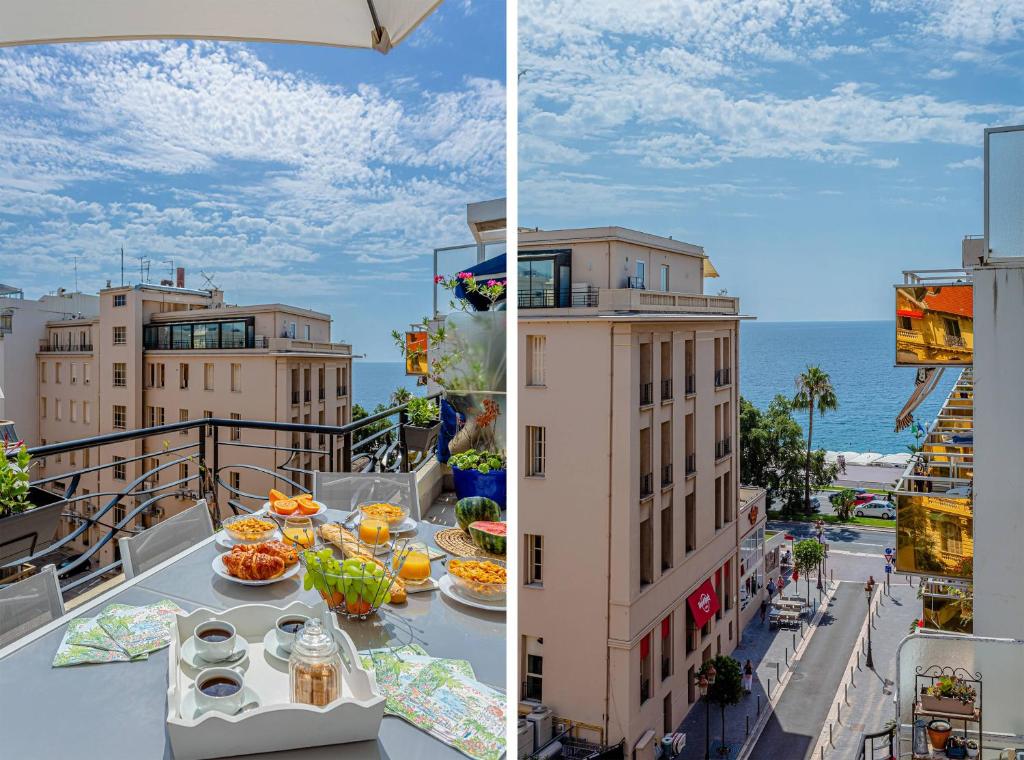 stół z jedzeniem na balkonie z widokiem na ocean w obiekcie MY CASA - Massenet w Nicei