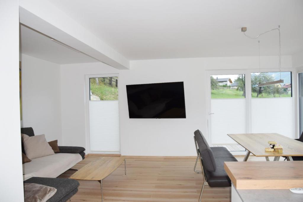 TV a/nebo společenská místnost v ubytování Ferienhaus Lurger