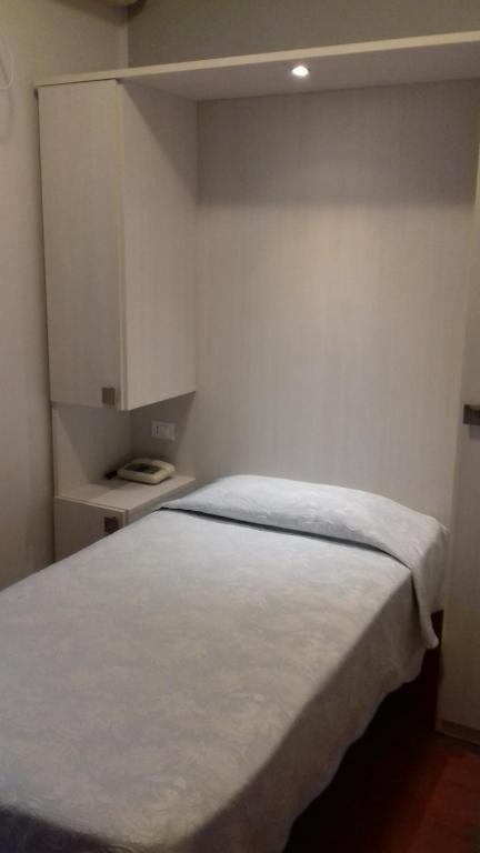 Postel nebo postele na pokoji v ubytování Air Hotel