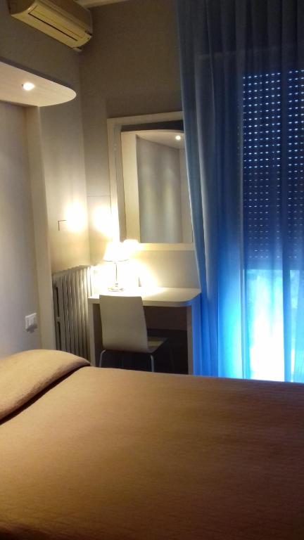 Postel nebo postele na pokoji v ubytování Air Hotel