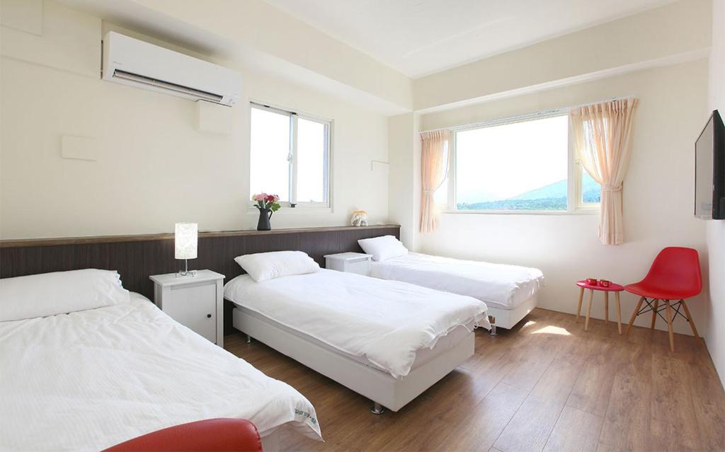 Postel nebo postele na pokoji v ubytování Lu Home Art