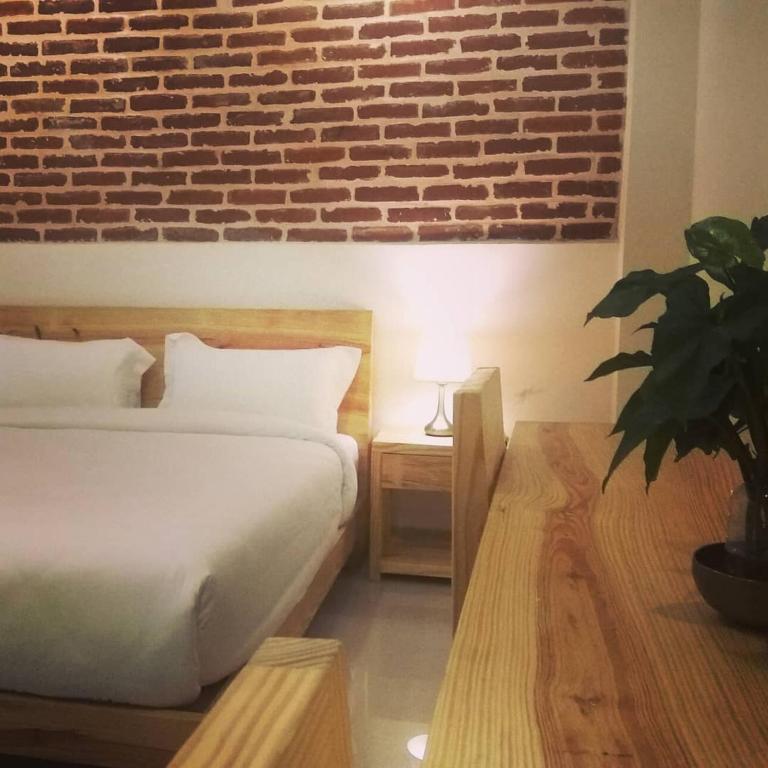 Postel nebo postele na pokoji v ubytování Sayami Home