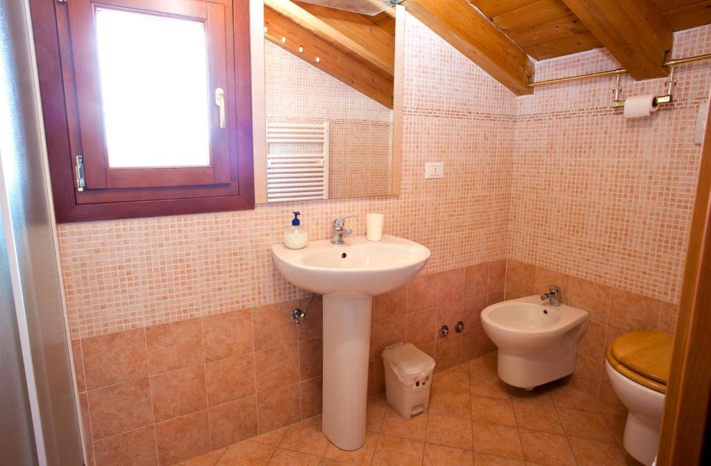 Koupelna v ubytování Locazioni Turistiche By Max