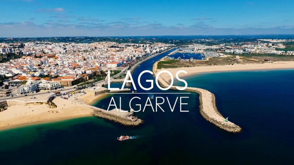 an aerial view of a beach in a city at Casa Algarvia in Lagos