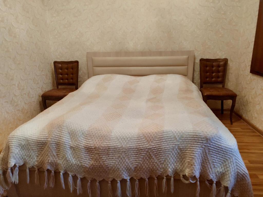Postel nebo postele na pokoji v ubytování Guest House Gelit