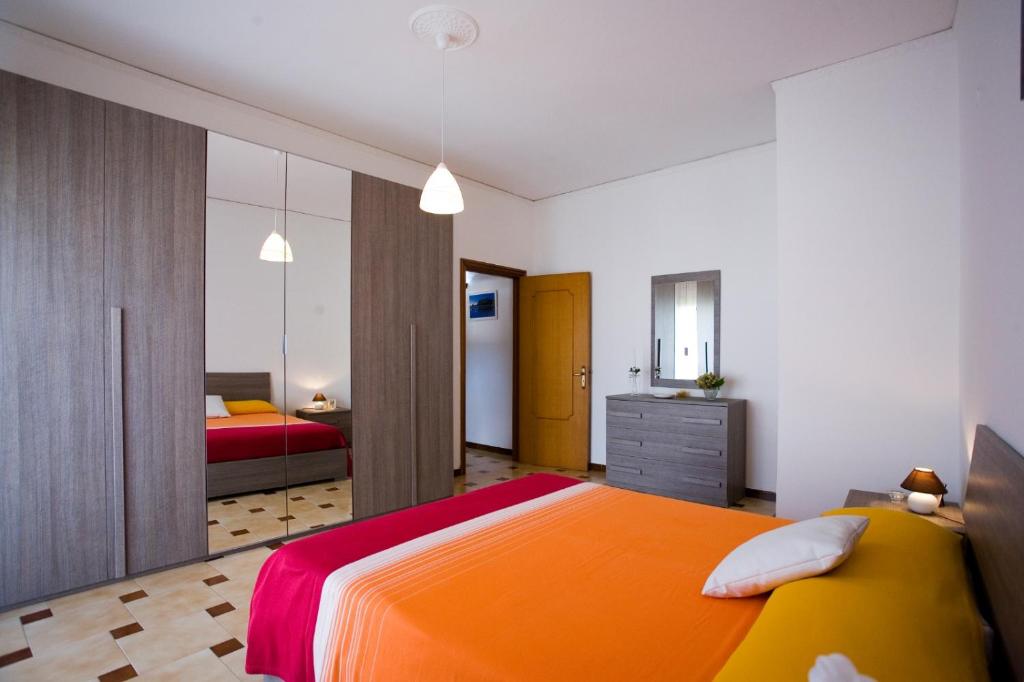 מיטה או מיטות בחדר ב-Casavacanza " LA CONCHIGLIA "