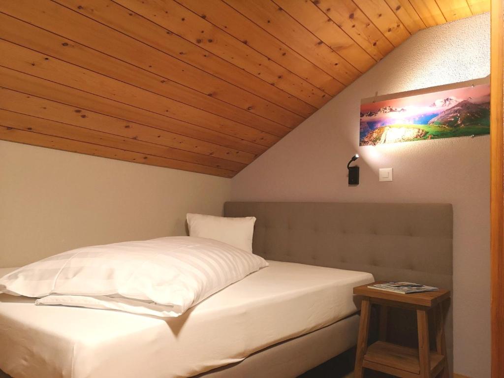Postel nebo postele na pokoji v ubytování Hotel National