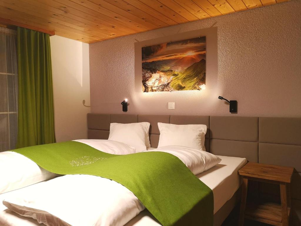Postel nebo postele na pokoji v ubytování Hotel National