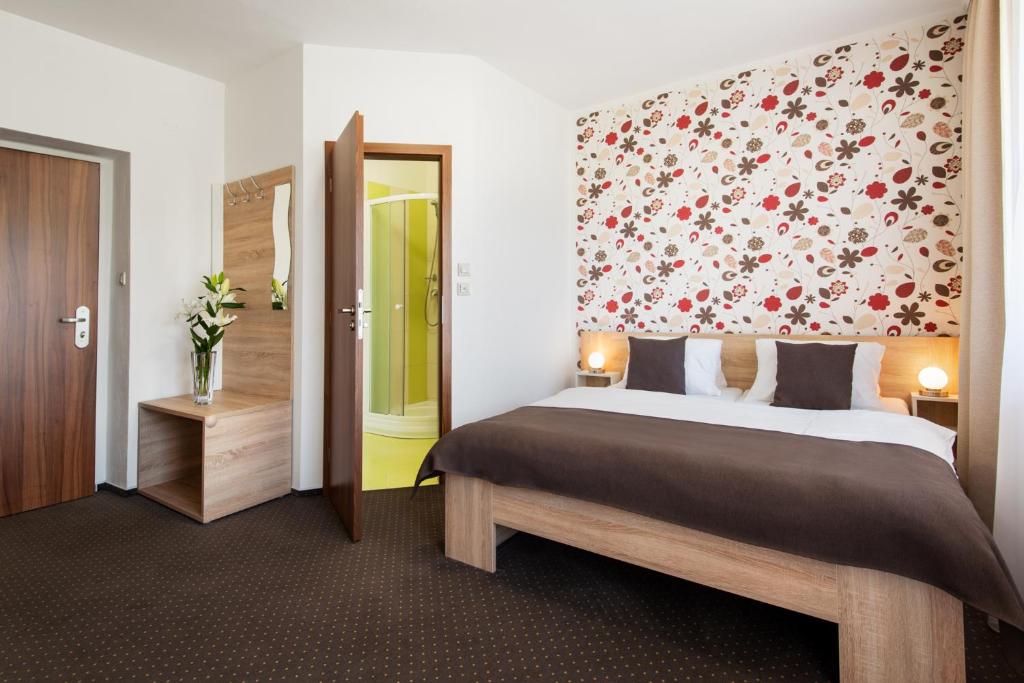 Letto o letti in una camera di Hotel Bon