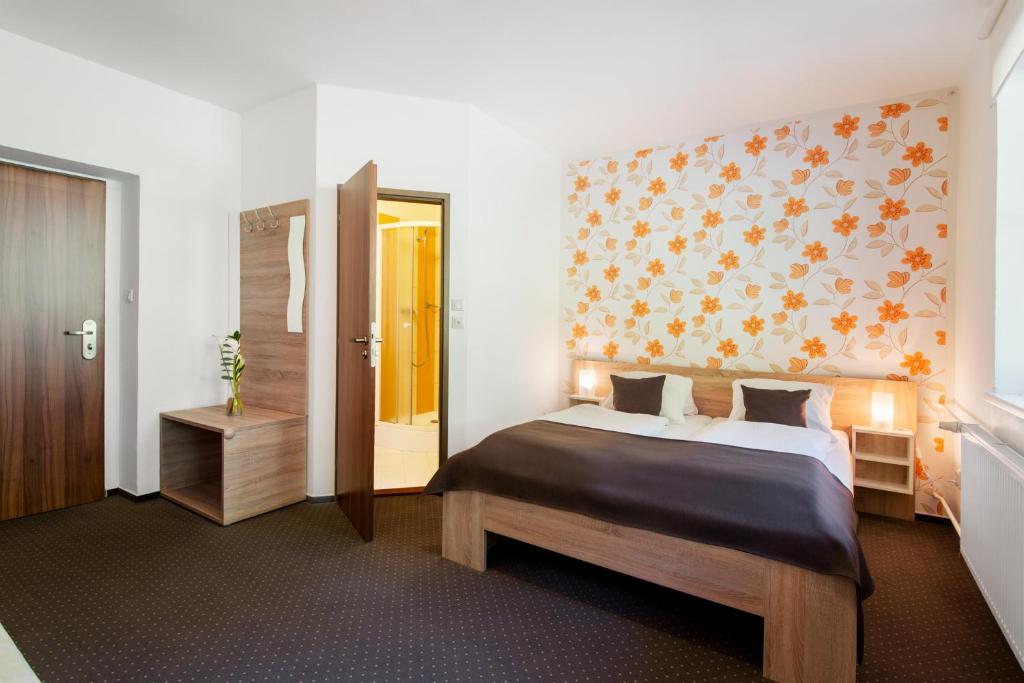 Letto o letti in una camera di Hotel Bon