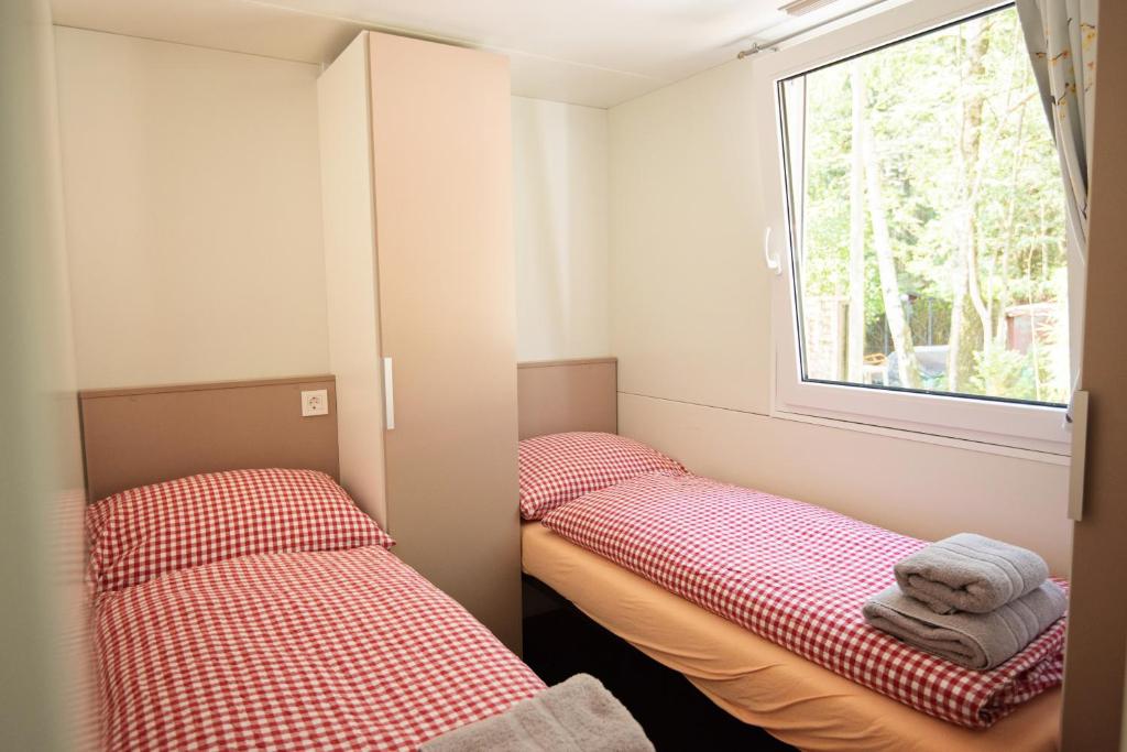 Postel nebo postele na pokoji v ubytování Ferienparadies Mühlenbach