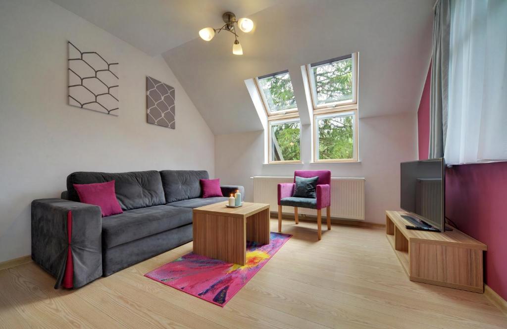 Posezení v ubytování Malina Apartamenty