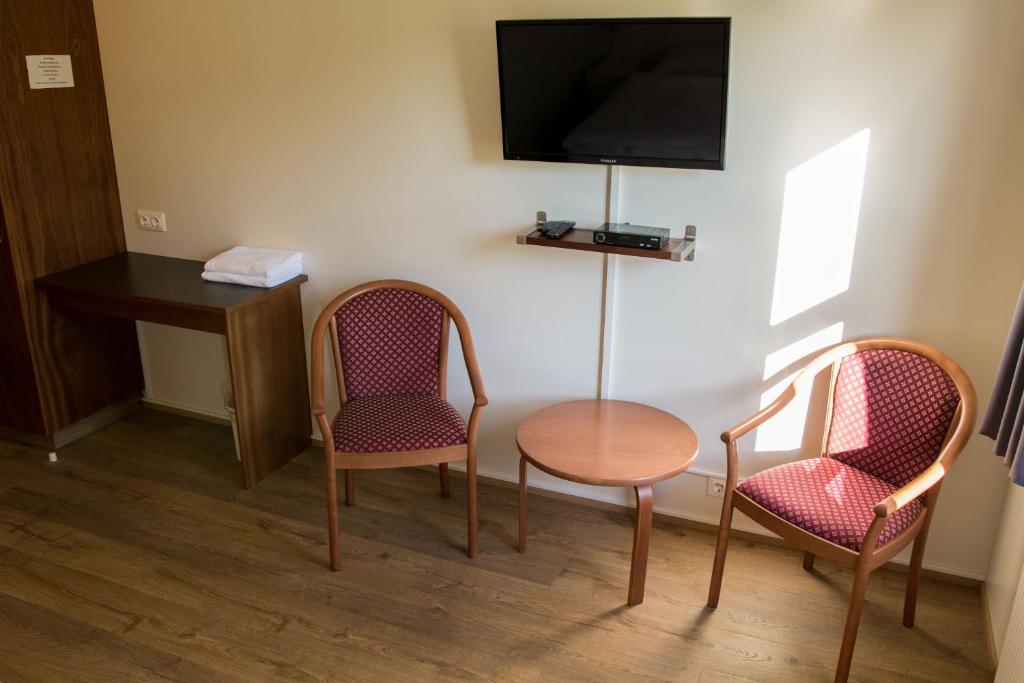 TV o dispositivi per l'intrattenimento presso Skipalaekur Guesthouse