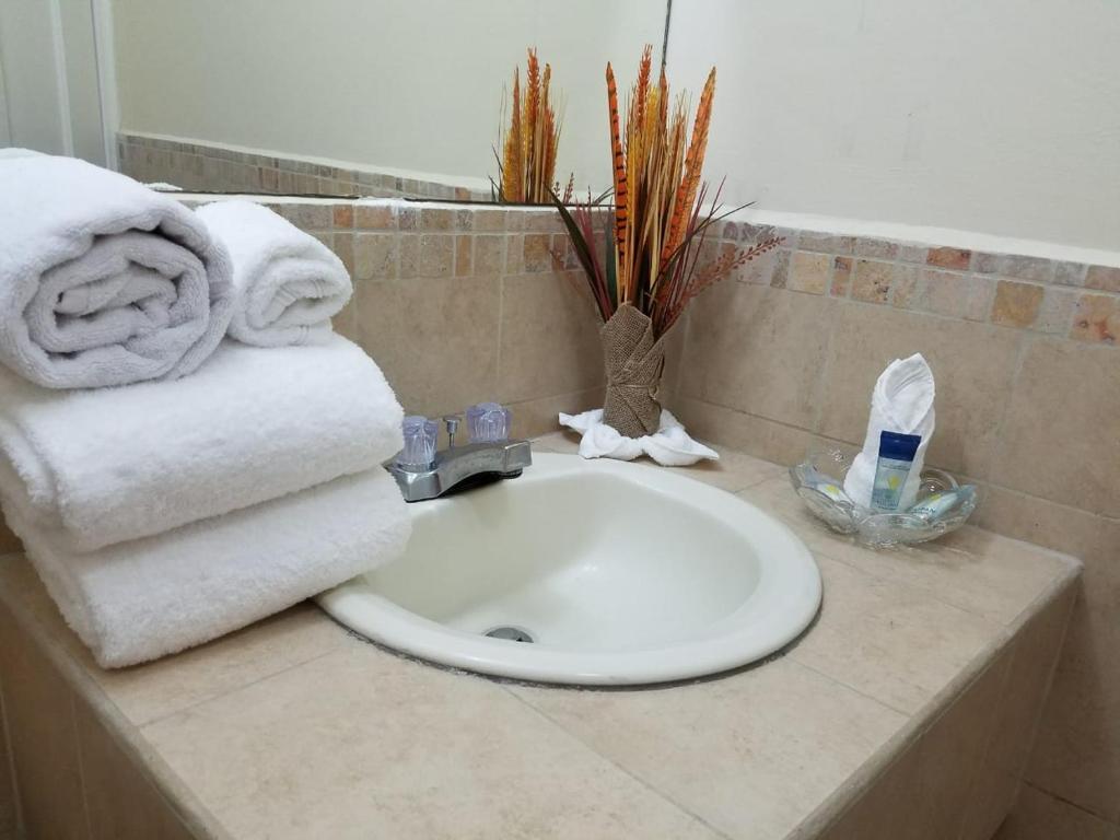 Koupelna v ubytování MH Boutique Hotel