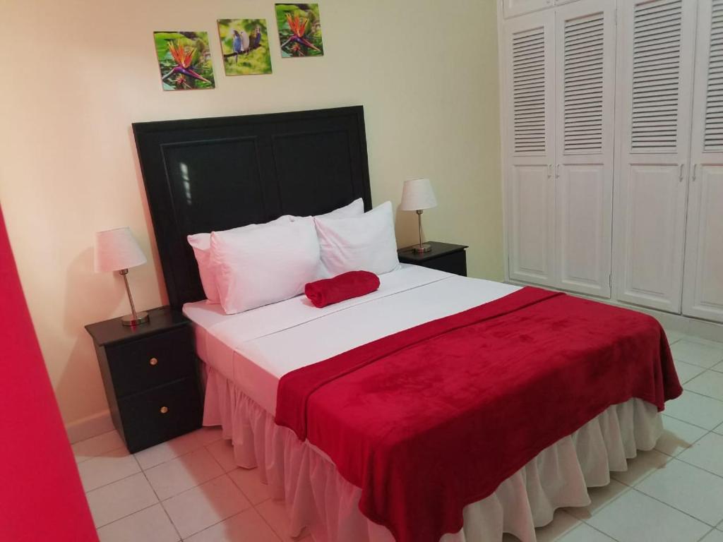 Postel nebo postele na pokoji v ubytování MH Boutique Hotel
