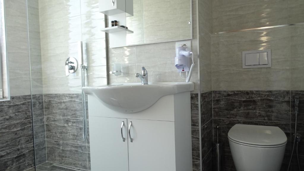Koupelna v ubytování Bistrica Hotel